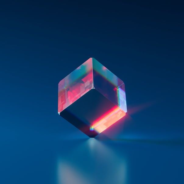 a red and black cube in a dark blue background